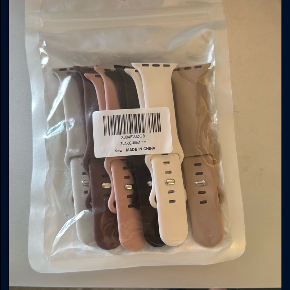 Apple Watch Bands in Black, Brown, and Cream